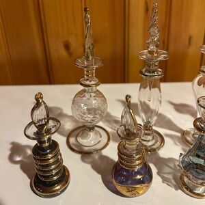 Artistic Glass Perfume Bottles with Gold Details